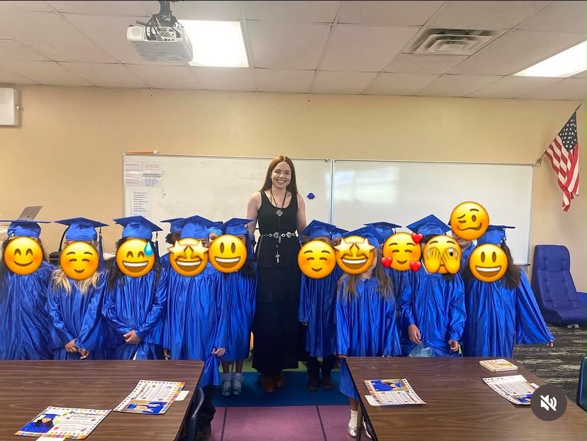 Erika Fuerte celebrating with her students